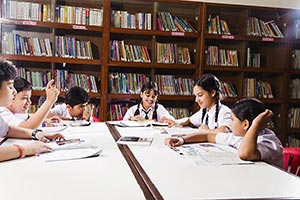 School Students Studying Library