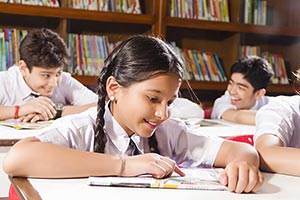 Students Reading Book Library