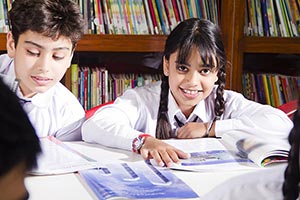 Students Reading Book Library