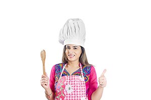 Woman kitchen Holding Utensil Thumbsup