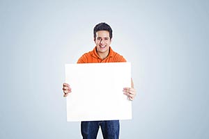 Man Showing Message Board