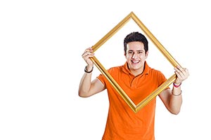 Man Holding Wooden Picture Frame