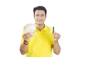 Man Showing Cash Credit Card