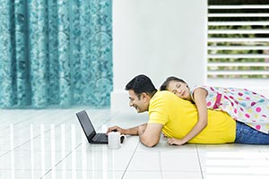 Father Daughter Using Laptop