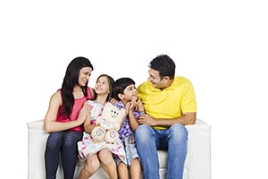 Parents Kids Sitting Sofa Enjoy