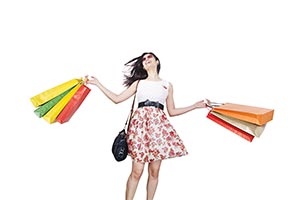 Woman Dancing Holding Shopping Bags