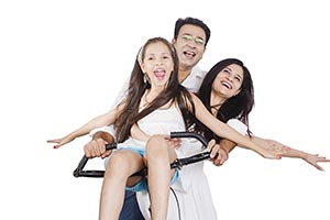 Happy Family Riding Bicycle Together