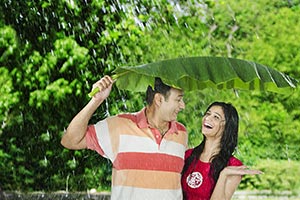 Couple Enjoy Rain Banana Leaf