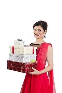 Woman Holding Gift Boxes Diwali Celebration