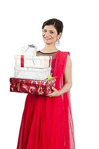Indian Woman Holding Diwali Gifts