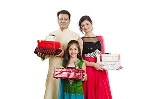 Parents Daughters Holding Gift Boxes Diwali