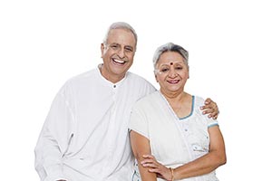 Happy Old Couple Sitting Together