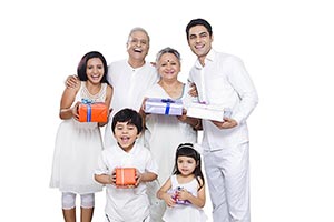 Group Indian Family Holding Gift Boxes