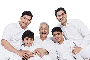 Happy Indian Family Sitting Sofa Fun