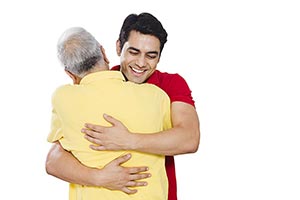 Father Adult Son Hugging Smiling