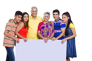 Portrait Happy Family Holding Message board