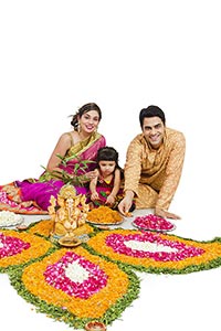 Parents Daughter Making Rangol During Diwali