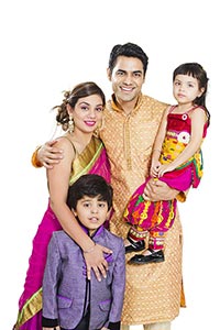 Smiling Indian Family Standing Parenting Diwali