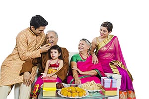 Joint Family Diwali Celebrating Feeding Laddu