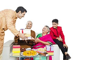 Son Giving Gifts Parents Diwali Festival