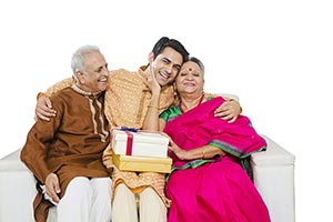 Parents Son Celebrating Diwali Festival Gifts