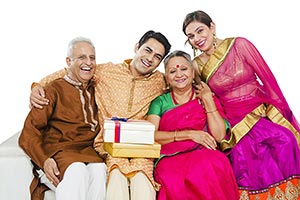 Indian Family Celebrating Diwali Gifts
