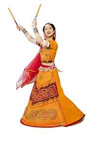 Indian Woman Performing Dandiya Raas Navratri Garb
