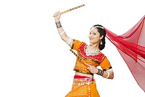 Indian Female Gujarati Performing Dandiya