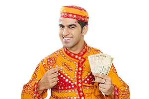 Indian Gujrati Man Showing Money Pointing