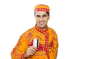 Traditional Gujrati Man Showing Credit Card