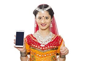 Gujrati Woman Showing Smartphone Thumbsup
