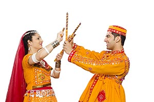 Couple Dancing Navratri Dandia Garba Festival