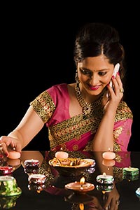 Woman Arranging Diya Talking Phone Diwali Festival