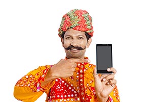 Gujrati Man Showing Smartphone Pointing