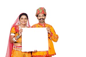 Gujrati Couple Holding Message board