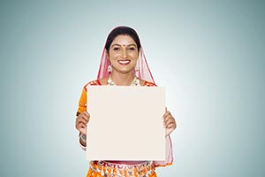 Gujrati Women Holding Piggy bank