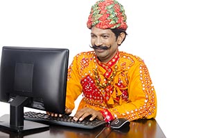 Gujrati Man Learning Computer