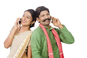 Rural Couple Talking Mobile Phone