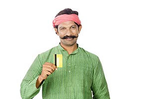 Rural Man Showing Credit Card