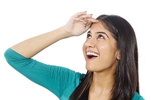 Young Girl Shielding eyes