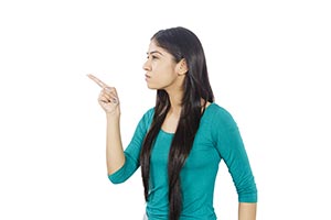 Young Woman Pointing Blaming