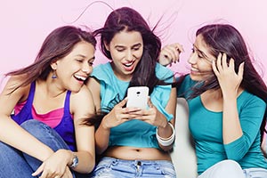 Girls Chatting Cell Phone