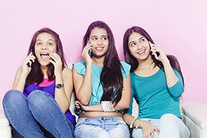 Girls Talking Mobile Phone