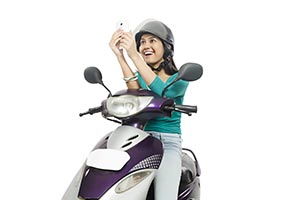 Woman Sitting Scooter Taking Selfie