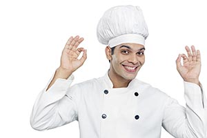 Portrait Smiling Male Chef Cook Showing oksign