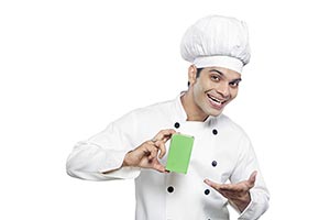 Male Chef Hotel Cook Showing Butter