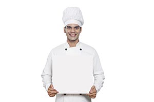 Male Chef Cook Holding Showing Blank board