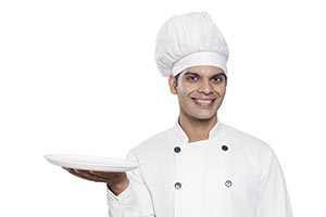 Male cook Uniform Holding Empty Plate