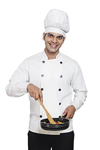 Male Chef Cooking Frying Vegetables