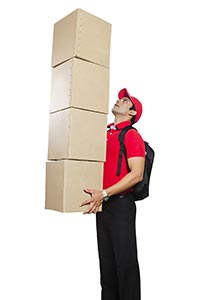 Indian Delivery Man Carrying Stack Boxes